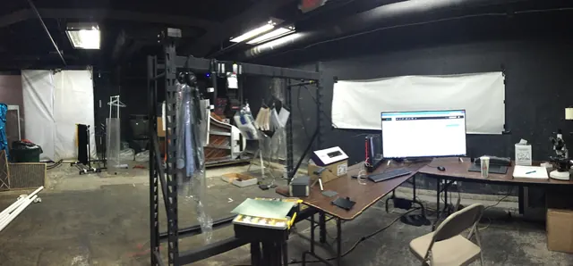 The first warehouse. Screens, tables and a long way to go.