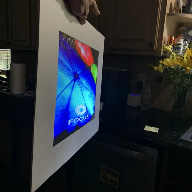 A framed display with blue content.