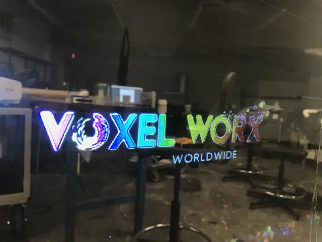The company mark projected onto its own material.