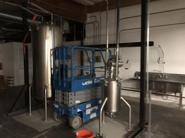 Scaling up: a lift and a mixing tank.