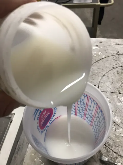 Pouring a white batch.