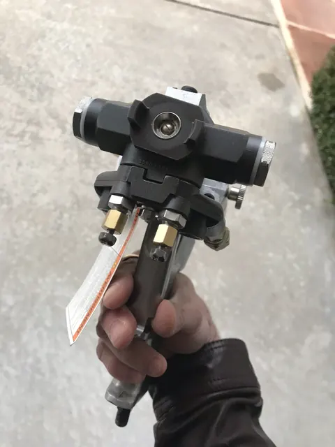 The spray gun.