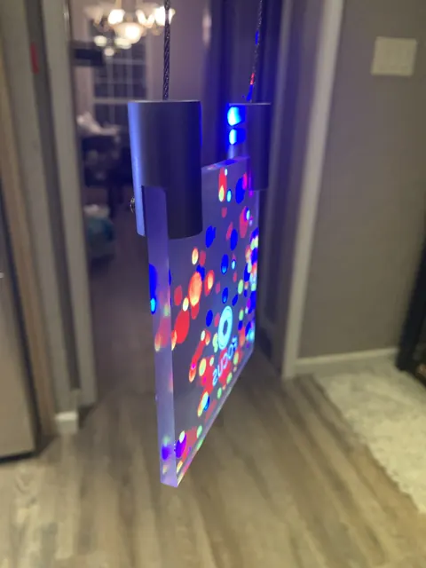 A tall vertical transparent display at home.