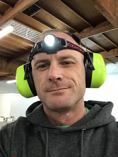 Headlamp and ear defenders. Spray days.