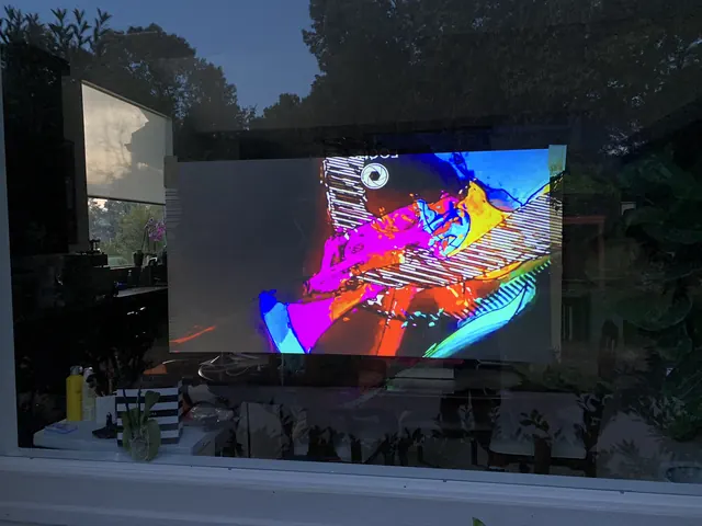 Window projection at a house, daylight.