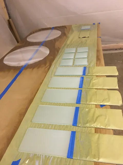 Masking large panes before coating.
