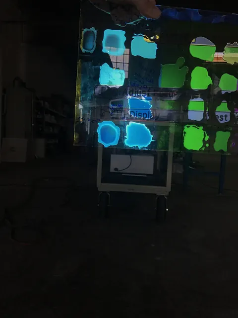 Shapes mapped across window panes at night.